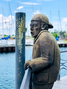 The Caller, wooden sculpture, Timmendorfer Strand, Baltic Sea, harbor, railing, Niendorf, Neustädter Bucht, figure, Kreis Ostholstein, Northern Germany, Bay of Lübeck, Schleswig-Holstein, Germany