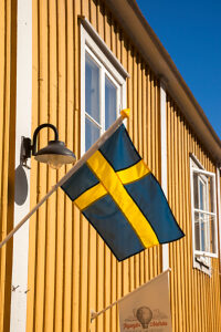 house, flag, Gränna, village, national flag, architecture, province of Smaland, Smaland, Jönköpings län, Jönköping, Sweden, Scandinavia