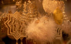 Christmas decorations, stars and feathers in gold Christmas decorations, stars and feathers in gold
