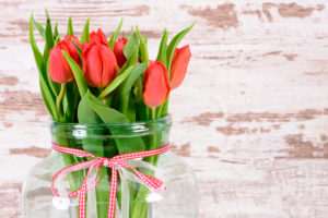 Tulip bunch in big glass vase to Easter Tulip bunch in big glass vase to Easter