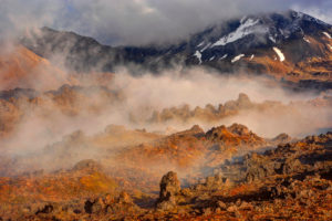 The level of Mordor. Early morning fog in the Oturere Valley of the Tongariro national park, a rocky volcano scenery in New Zealand. The level of Mordor. Early morning fog in the Oturere Valley of the Tongariro national park, a rocky volcano scenery in New Zealand.