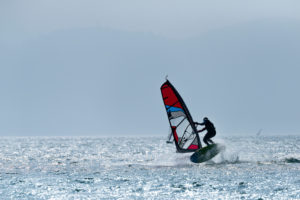 Windsurfer on the Walchensee in Bavaria, Germany. Windsurfer on the Walchensee in Bavaria, Germany.