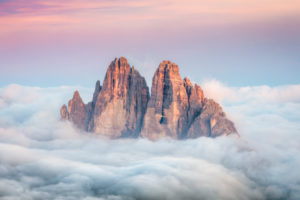 Tre Cime di Lavaredo emerging from the sea of clouds, Sexten Dolomites, South Tyrol, Bolzano, Italy, Europe Tre Cime di Lavaredo emerging from the sea of clouds, Sexten Dolomites, South Tyrol, Bolzano, Italy, Europe