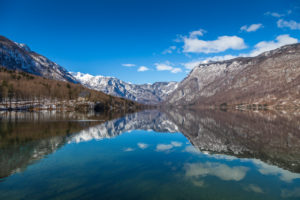 Bohinj lake and the snowy Julian Alps on the background, Ribčev Laz, Upper Carniola, Triglav National Park, Slovenia