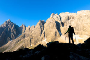 hiker in silhouette in the vallon popera, monte popera, comelico superiore, belluno, veneto, italy
