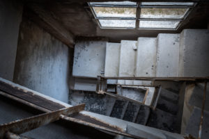 staircase in an old abandoned cement plant, industrial ruins, castellavazzo, belluno, veneto, italy