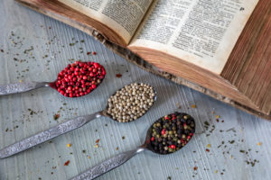 spoons full of multicolored peppercorns, pepper, spices