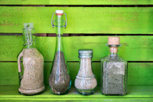 sea sand in glass bottles, souvenirs from summer holidays