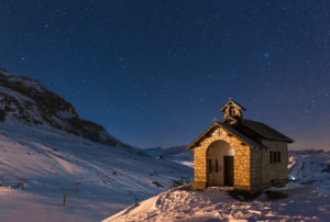 Europe, Italy, Dolomites. The alpine church at Pordoi pass at night Europe, Italy, Dolomites. The alpine church at Pordoi pass at night