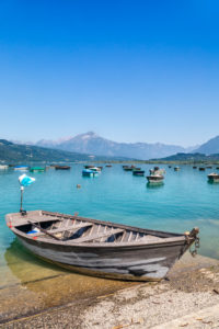 fishermen boats anchored to the poiatte, lake of santa croce, farra d'Apago, alpago, belluno, veneto, italy fishermen boats anchored to the poiatte, lake of santa croce, farra d'Apago, alpago, belluno, veneto, italy