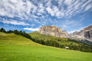 Lonely wooden cabin in Salèi valley, on the background Sella Towers / Sellatürme and Piz Ciavazes, Canazei, Fassa valley, Dolomites, Trentino Alto Adige, Italy Lonely wooden cabin in Salèi valley, on the background Sella Towers / Sellatürme and Piz Ciavazes, Canazei, Fassa valley, Dolomites, Trentino Alto Adige, Italy