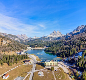 Aerial view of Lake Misurina with the Cadini di Misurina and Tre Cime di Lavaredo mountain groups in the background, near Auronzo di Cadore, Belluno province, Veneto region, northeastern Italy