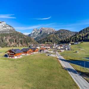 Aerial view of Cima Sappada, a traditional alpine village in the Carnic Alps, municipality of Sappada, Udine, Friuli Venezia Giulia, northeastern Italy