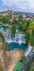 Aerial view of the Pliva waterfall with the historic town of Jajce, Central Bosnia Canton, Bosnia and Herzegovina Aerial view of the Pliva waterfall with the historic town of Jajce, Central Bosnia Canton, Bosnia and Herzegovina