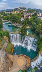 Aerial view of the Pliva waterfall with the historic town of Jajce, Central Bosnia Canton, Bosnia and Herzegovina Aerial view of the Pliva waterfall with the historic town of Jajce, Central Bosnia Canton, Bosnia and Herzegovina