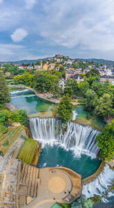 Aerial view of the Pliva waterfall with the historic town of Jajce, Central Bosnia Canton, Bosnia and Herzegovina Aerial view of the Pliva waterfall with the historic town of Jajce, Central Bosnia Canton, Bosnia and Herzegovina