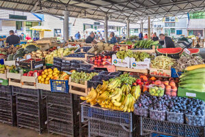A vibrant farmers market filled with fresh fruits and vegetables under a covered structure, showcasing local produce and daily life. Travnik, Central Bosnia, Bosnia and Herzegovina A vibrant farmers market filled with fresh fruits and vegetables under a covered structure, showcasing local produce and daily life. Travnik, Central Bosnia, Bosnia and Herzegovina