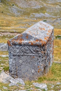 Carved medieval stecak tombstone at the Dolovi-Poljice necropolis on planina Visocica, a National Monument of Bosnia and Herzegovina, near Odzaci, Konjic region, Herzegovina-Neretva Canton, Bosnia and Herzegovina Carved medieval stecak tombstone at the Dolovi-Poljice necropolis on planina Visocica, a National Monument of Bosnia and Herzegovina, near Odzaci, Konjic region, Herzegovina-Neretva Canton, Bosnia and Herzegovina