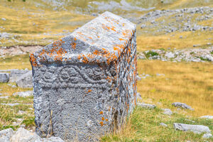 Carved medieval stecak tombstone at the Dolovi-Poljice necropolis on planina Visocica, a National Monument of Bosnia and Herzegovina, near Odzaci, Konjic region, Herzegovina-Neretva Canton, Bosnia and Herzegovina Carved medieval stecak tombstone at the Dolovi-Poljice necropolis on planina Visocica, a National Monument of Bosnia and Herzegovina, near Odzaci, Konjic region, Herzegovina-Neretva Canton, Bosnia and Herzegovina
