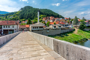 View of the town of Konjic with the Carsijska Mosque and the Stara Cuprija Bridge spanning the Neretva River, Herzegovina-Neretva Canton, Bosnia and Herzegovina View of the town of Konjic with the Carsijska Mosque and the Stara Cuprija Bridge spanning the Neretva River, Herzegovina-Neretva Canton, Bosnia and Herzegovina