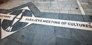 The 'Sarajevo Meeting of Cultures' marker on the pavement where Ferhadija Street meets Saraci Street, symbolizing the meeting point between the Ottoman and Austro-Hungarian parts of the city. Sarajevo, Bosnia and Herzegovina The 'Sarajevo Meeting of Cultures' marker on the pavement where Ferhadija Street meets Saraci Street, symbolizing the meeting point between the Ottoman and Austro-Hungarian parts of the city. Sarajevo, Bosnia and Herzegovina