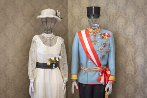 Historical display inside Sarajevo City Hall (Vijecnica), featuring the outfits of Archduke Franz Ferdinand of Austria and his wife Sophie, in the Memorial Corner dedicated to their 1914 visit and the Sarajevo assassination. Sarajevo, Bosnia and Herzegovina