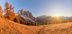 Golden autumn mood around Monte Pelmo at sunset under a clear autumn sky in Val Fiorentina, Dolomites, Borca di Cadore, Belluno province, Veneto, Italy Golden autumn mood around Monte Pelmo at sunset under a clear autumn sky in Val Fiorentina, Dolomites, Borca di Cadore, Belluno province, Veneto, Italy