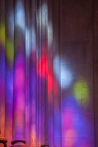Beautiful colorful sunlight window reflections on the columns in a church, Andalusia, Spain, Carmona, Iglesia Prioral de Santa Maria, Beautiful colorful sunlight window reflections on the columns in a church, Andalusia, Spain, Carmona, Iglesia Prioral de Santa Maria,