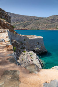 View on fortress of Spinalonga and the blue Mediterranean Sea, Greece, Crete, Kalydon View on fortress of Spinalonga and the blue Mediterranean Sea, Greece, Crete, Kalydon