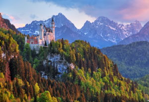 Spring landscape with Neuschwanstein Castle against Tannheim Mountains, Hohenschwangau, Romantic Road, Ostallgäu, Allgäu, Swabia, Bavaria, Germany Spring landscape with Neuschwanstein Castle against Tannheim Mountains, Hohenschwangau, Romantic Road, Ostallgäu, Allgäu, Swabia, Bavaria, Germany