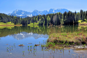Geroldsee (Wagenbrüchsee) at the hamlet of Gerold in spring against Karwendel mountains, Krün, Werdenfelser Land, Upper Bavaria, Bavaria, Germany Geroldsee (Wagenbrüchsee) at the hamlet of Gerold in spring against Karwendel mountains, Krün, Werdenfelser Land, Upper Bavaria, Bavaria, Germany