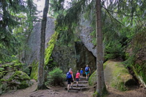 Luisenburg rock labyrinth with hikers at the Goethefelsen, Wunsiedel, Fichtelgebirge, Upper Franconia, Franconia, Bavaria, Germany Luisenburg rock labyrinth with hikers at the Goethefelsen, Wunsiedel, Fichtelgebirge, Upper Franconia, Franconia, Bavaria, Germany
