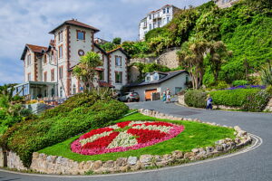 Flower border on a slope in the seaside resort of Ventnor, Isle of Wight, Hampshire, Great Britain, England
