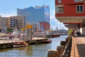 Sandtorkai with Sandtorhafen and Elbphilharmonie on the Elbe island Grasbrook in Hafencity at the harbour, Hamburg, Hamburg State, Germany Sandtorkai with Sandtorhafen and Elbphilharmonie on the Elbe island Grasbrook in Hafencity at the harbour, Hamburg, Hamburg State, Germany