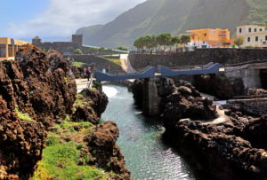 Inlet in lava rock at the place, Porto Moniz, Madeira island, Portugal Inlet in lava rock at the place, Porto Moniz, Madeira island, Portugal