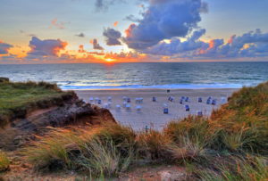 Sunset over the beach at the Rotes Kliff, Kampen, North Sea island, Sylt, North Frisian Islands, North Frisia, Schleswig-Holstein, Germany Sunset over the beach at the Rotes Kliff, Kampen, North Sea island, Sylt, North Frisian Islands, North Frisia, Schleswig-Holstein, Germany