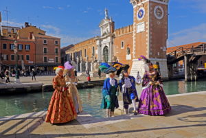 Costumed group in historical robes at the Arsenale during Carnival, Venice, Veneto, Italy Costumed group in historical robes at the Arsenale during Carnival, Venice, Veneto, Italy
