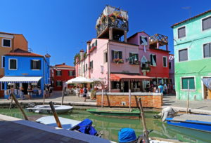 Canal with colorful houses and typical roof terraces, fisherman island Burano in the lagoon of Venice, Venice, Veneto, Italy