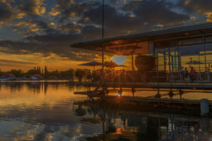 Hannover, Maschsee, sailing school and pier 51 in the sundown Hannover, Maschsee, sailing school and pier 51 in the sundown