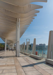 One day in Malaga; Impressions from this city in Andalusia, Spain. The beautiful modern boulevard promenade "El Palmeral de las Sorpresas" by architect Jerónimo Junquera. One day in Malaga; Impressions from this city in Andalusia, Spain. The beautiful modern boulevard promenade "El Palmeral de las Sorpresas" by architect Jerónimo Junquera.