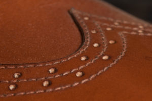 Leather shoe, handcrafted, close-up, seam, close-up Leather shoe, handcrafted, close-up, seam, close-up