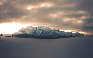 View above snow-covered landscape to Wetterstein Range, Mittenwald, Werdenfelser Land, district Garmisch-Partenkirchen, Bavaria, Germany View above snow-covered landscape to Wetterstein Range, Mittenwald, Werdenfelser Land, district Garmisch-Partenkirchen, Bavaria, Germany