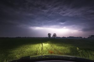 A thunderstorm over Wietmarschen near Nordhorn photographed from a car in a meadow A thunderstorm over Wietmarschen near Nordhorn photographed from a car in a meadow