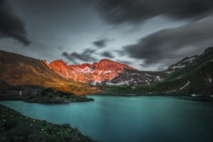 Sunset at the Schrecksee. In the background in the alpenglow the Lahner Scharte Sunset at the Schrecksee. In the background in the alpenglow the Lahner Scharte