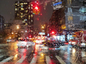 Street, traffic, car, rain drops on windshield, New York in rain Street, traffic, car, rain drops on windshield, New York in rain