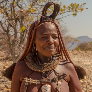 Himba woman with traditional headdress Himba woman with traditional headdress