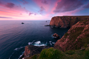 Colored sunset at Benwee Head, County Mayo, Ireland Colored sunset at Benwee Head, County Mayo, Ireland