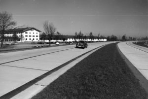 View of the city hall area with parking anddriving cars at the Chiemsee, Germany 1930s. View of the city hall area with parking anddriving cars at the Chiemsee, Germany 1930s.