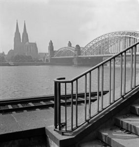 View from Deutz to the skyline of Cologne with Hohenzollern railway bridge, Germany 1930s. View from Deutz to the skyline of Cologne with Hohenzollern railway bridge, Germany 1930s.
