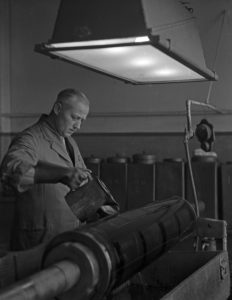 A working day at a printing office, Germany 1930s. A working day at a printing office, Germany 1930s.